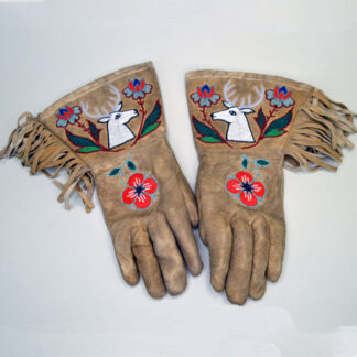 Beaded leather gauntlets with a floral and deer motif.
