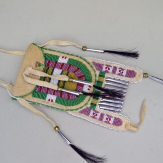 Front view of a green Arapaho style strike a lite bag.