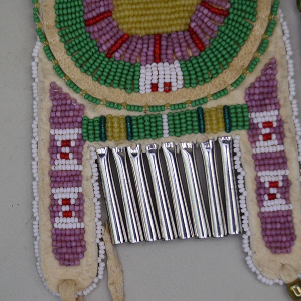 Close up front view of a green Arapaho style strike a lite bag.