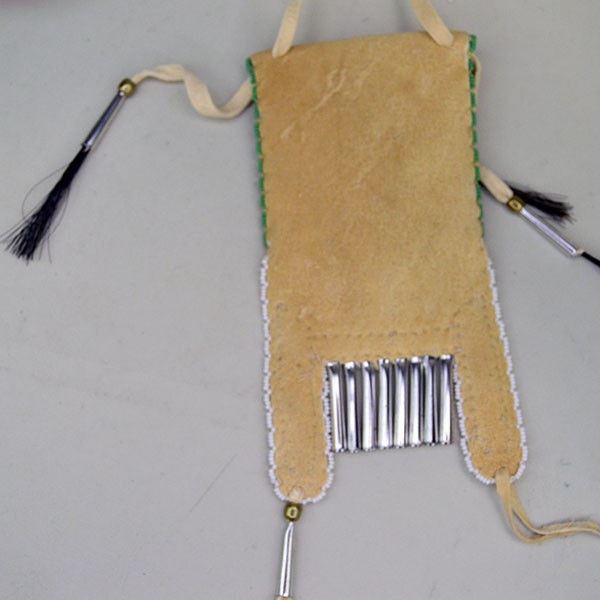 Back view of a green Arapaho style strike a lite bag.