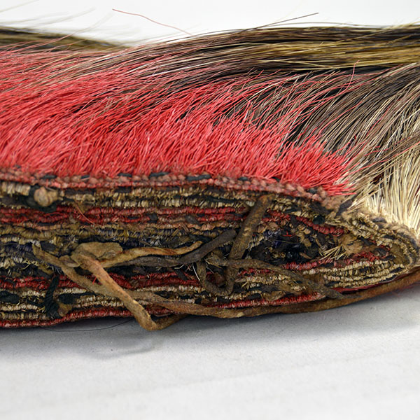 Antique hair base roach with red deer hair close up of base bottom.