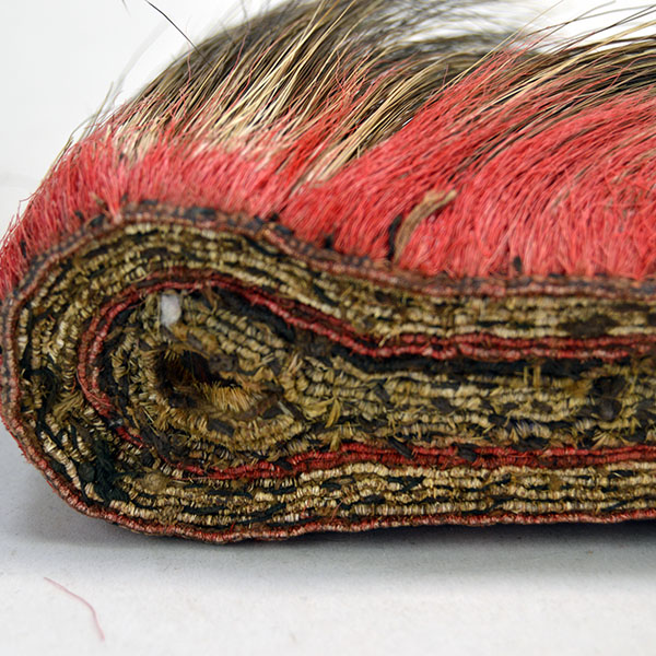 Antique hair base roach with red deer hair close up of base bottom.