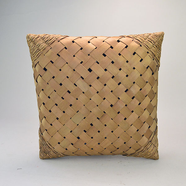 This antique Passamaquoddy handkerchief basket, measuring approximately 9½" by 9½", features a beautifully woven back that showcases the intricate craftsmanship.