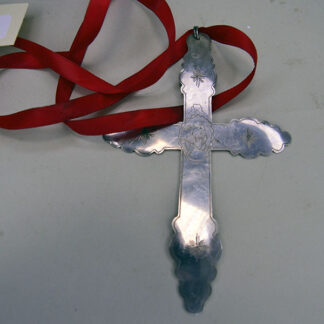 This vintage necklace features a striking French-style cross pendant, crafted in stamped silver with elegant, timeworn detail. One of a Kind.