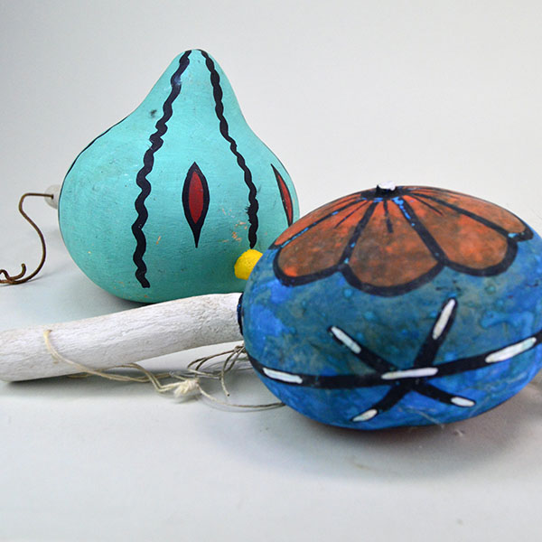 Add these spectacular Gourd Rattles- Hopi Style to your collection! Hopi Style Flower one ,and other a cross on one side and a Watermelon face on the other.
