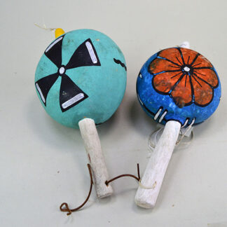 Add these spectacular Gourd Rattles- Hopi Style to your collection! Hopi Style Flower one ,and other a cross on one side and a Watermelon face on the other.