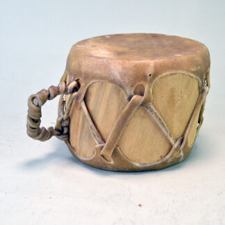This Taos-style double-headed drum delivers a distinctive sound that reflects its handcrafted origins. 4" tall x 4.75" wide. One of a Kind