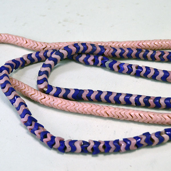 Add these Antique Trade Beads- Snake Beads to our Collection. Receive 3 strands. Zig-zag in shape, these beads are like little puzzle pieces. one of a kind