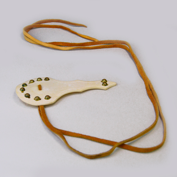 Bone roach spreader with tacks front view with leather ties.