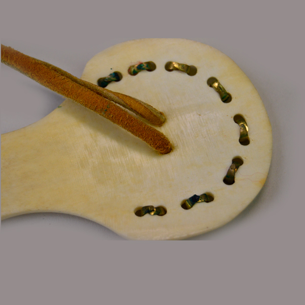 Bone roach spreader with tacks close up back view of tacks.