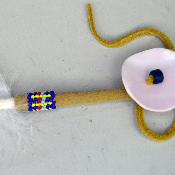 Smudge Feather Partial Beading Handpainted Feather with Deerskin Leather, blue beaded cuff and concho detail