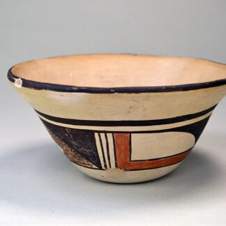 Add this Hopi-style pottery bowl to your collection or use it to hold small items. This measures 5.5 inches wide by 2.75 inched tall. one of a kind.