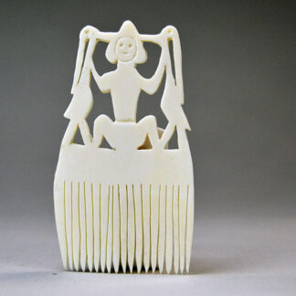 Celebrate tradition and artistry with this handcrafted bone hair comb in classic Seneca style. Standing 3.25" tall and 2" wide. One of a Kind.