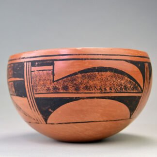 Add this Hopi-Style Red Clay Pottery Bowl to your collection or use it as a decorative accent. measures 3.5" tall by 6" wide. One of a Kind.