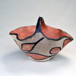 This Santa Domingo pottery bowl will make a fine addition to your collection. The bowl measures 6 inches wide by 4 inches high.