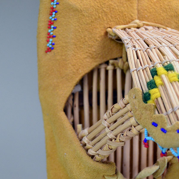 This Vintage Cradleboard- Doll is ready for display in your home! It is in remarkably great condition for its age made in 1988 in Reno Nevada. Picture here is the inside of the cradleboard and the visor.