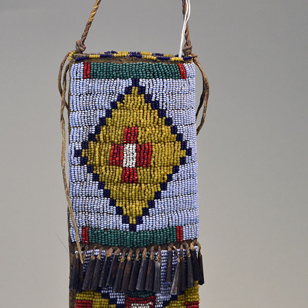 This fully beaded Northern Plains style Knife Sheath- Light Blue will make a great addition to your collection! One of a Kind. Pictured here is the top.