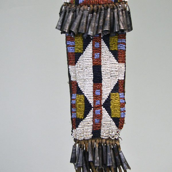 This fully beaded Northern Plains style Knife Sheath- Squared Ended will make a great addition to your collection! One of a Kind. Picture here is the beaded work and the tin cones.