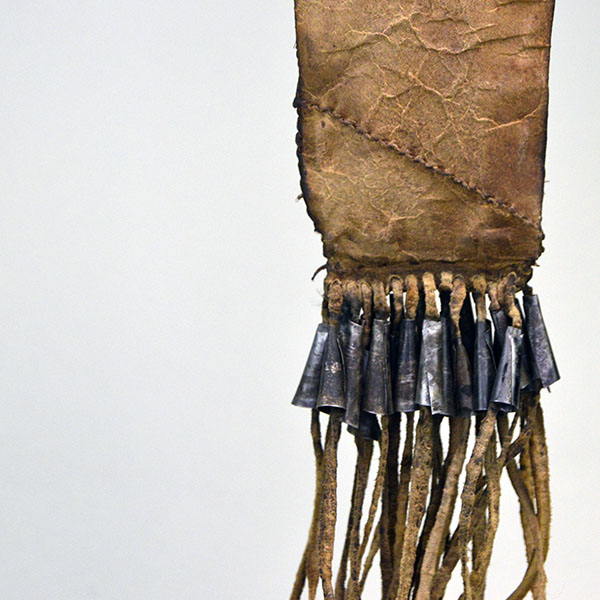 This fully beaded Northern Plains style Knife Sheath- Squared Ended will make a great addition to your collection! One of a Kind. Pictured here is the back showing the tassels and the tin cones.