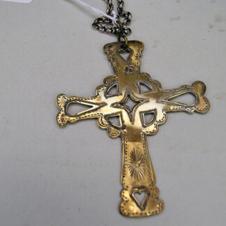 This gold‑plated sterling silver cross necklace delivers bold size and intricate artistry. The 12.5" silver chain supports a striking 3.75" x 3" cross.