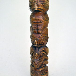 Add this delightful 12-inch cedar Totem Pole- Northwest Coast Style to your collection! Expertly carved from a single piece of cedar wood.