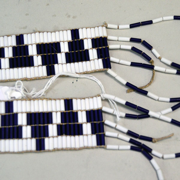 Wampum strap with dangles - 42 inches long - close up of dangles.