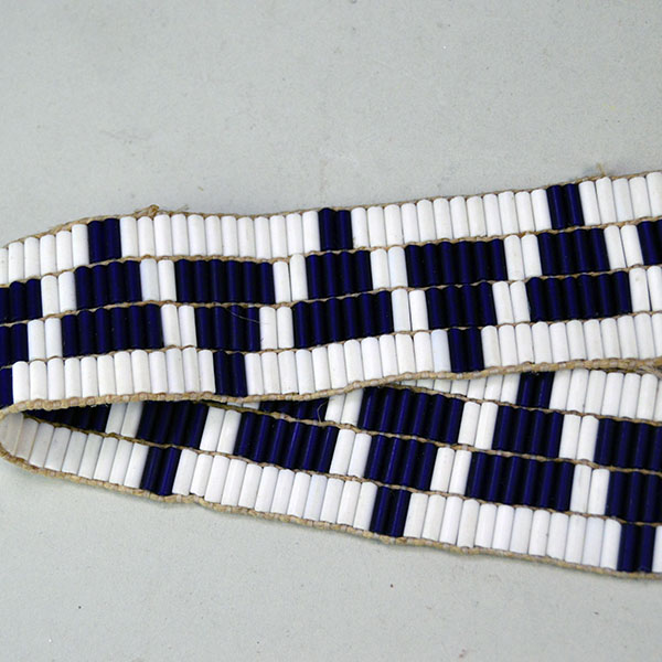 Wampum strap with dangles - 42 inches long - close up of center.