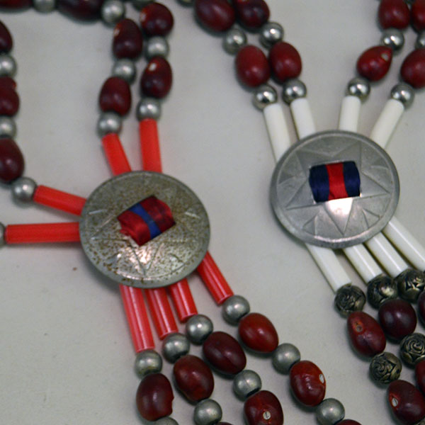 hollow metal beads and matte hollow metal beads. Pictured here is the stamped concho with the tube beads.