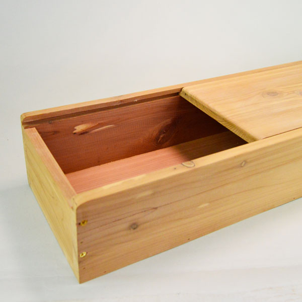 Give your feathers a safe, reliable place to rest with this Cedar Box- Slide Top. interior measures 22.75 inches long, 5.75 inches wide, and 3 inches deep. Top view.