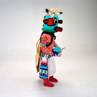 This Katsina- Hopi Cow delivers standout presence and authentic craftsmanship. It stands 8.75 inches tall and 3.5 inches wide. one of a kind.