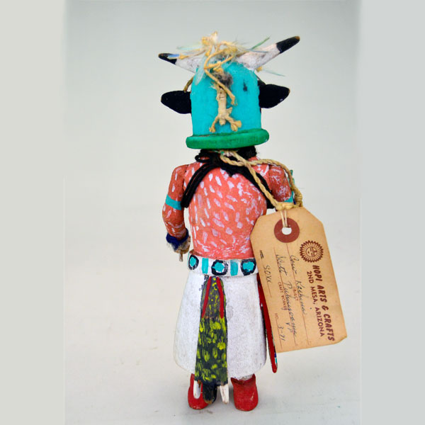 This Katsina- Hopi Cow delivers standout presence and authentic craftsmanship. It stands 8.75 inches tall and 3.5 inches wide. one of a kind. pictured here is the back.