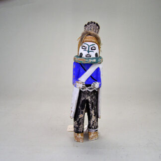 Katsina- Rainmaker Style stands 9 inches tall, hand‑carved from cottonwood and hand‑painted with tempera colors. One of a Kind.