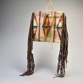Add this brightly painted Parfleche Bag with Fringe to your collection! The crafter created this small Parfleche from rawhide. One of a Kind.