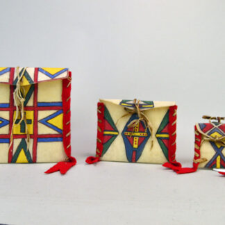 Add these brightly painted Parfleche Container 3 Set to your collection! The crafter created these small Parfleche from rawhide.