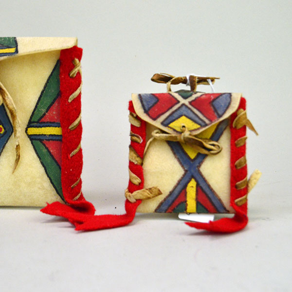 Add these brightly painted Parfleche Container 3 Set to your collection! The crafter created these small Parfleche from rawhide. Pictured here is the smallest one.