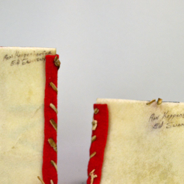 Add these brightly painted Parfleche Container 3 Set to your collection! The crafter created these small Parfleche from rawhide. One of a Kind. Pictured here is the signatures on the back.