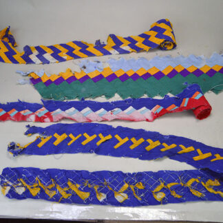 These Patchwork Pieces- Seminole Style offer four vibrant, eye‑catching panels recycled from a vintage jacket or skirt. One of a Kind.