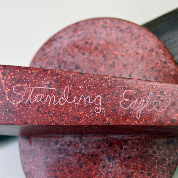 striking centerpiece to your collection with this impressive Peace Pipe- Catlinite Disk. the piece measures a full 22.5 inches. One of a Kind. pictured here is the etching standing eagle.