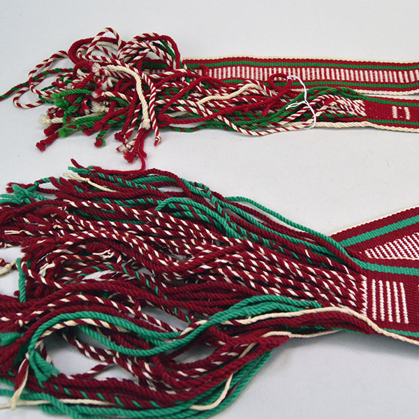 Add vibrant style to your dance regalia with this handwoven Sash- Hopi Style Set of two. 49 inches long by 3 inches wide, 47.5 inches long by 2 inches wide. Pictured here is the twisted tassels.