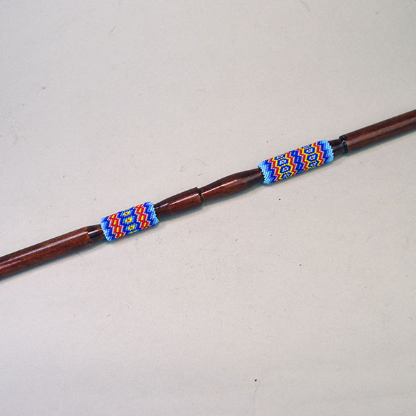 Tail Stick- Carved