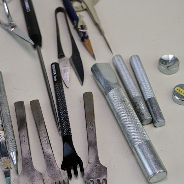 This comprehensive Tool- Leather Stamping Lot brings together quality tools designed for clean cuts, sharp impressions, and accurate layout work. Pictured here is a up close of the tools.