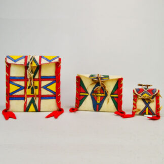 Add these brightly painted Parfleche Container 3 Set to your collection! The crafter created these small Parfleches from rawhide.