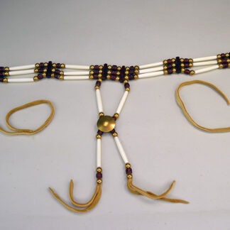 three‑row Choker- White Center Cranberry stands out with its striking mix of bone, brass, and deep cranberry‑colored crow beads. measures 16 inches long.