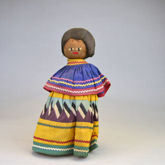 Doll- Woman Vintage Seminole. colorful Cape and Dress made with traditional Seminole materials. doll stands approximately 9 inches tall., one of a kind.