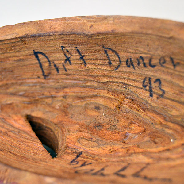 Masks- 2 Pieces set features lightweight wood masks, each hand‑carved, one carved face, and other raised face carved directly into the wood. pictured here is the back drift dancer 93 and signature of crafter.