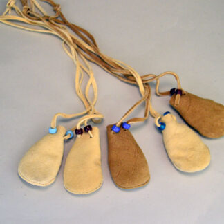 charming Neck Bag- Handsewn Braintanned. from soft Braintanned deerskin leather. On the neck strap he strung crow beads. Limited Stocks.