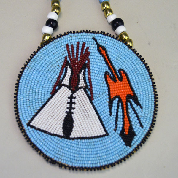 Necklace- Rosette Beaded Thunder Bird and Tipi. 13/0 Cut Seed Beads. Rosette measures approximately 4″ in diameter. One of a Kind. pictured here is the Tipi and thunder bird.
