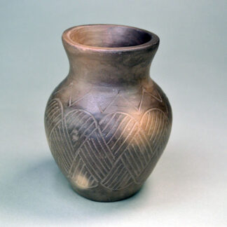 hand‑coiled pottery signed by Amanda Swimmer to your collection. pot stands 5 inches tall and features a beautiful basket‑weave decoration. one of a kind.