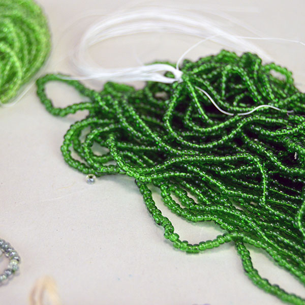 Seed Beads- 23 oz Assorted 11/0 lot. You will get regular, transparent, color lined, tube, and Czech beads, in assorted colors. Limited Quantities. pictured here are some of the assorted colors showing trans green.