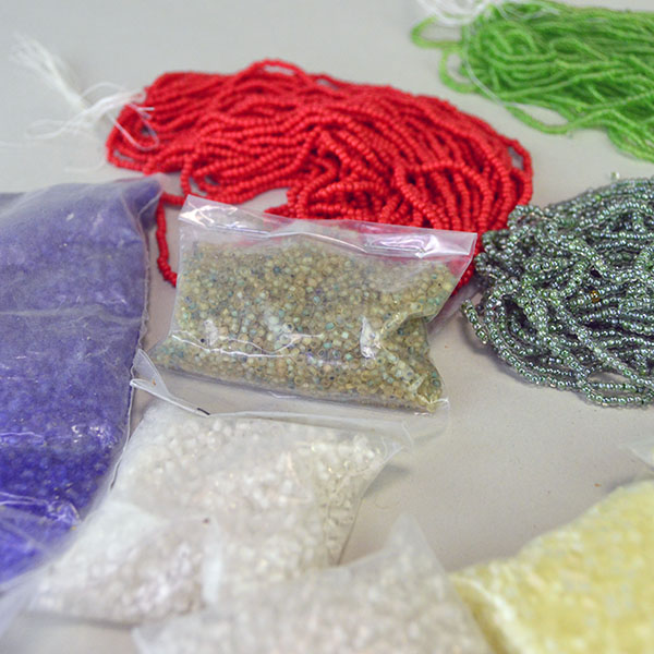 Seed Beads- 23 oz Assorted 11/0 lot. You will get regular, transparent, color lined, tube, and Czech beads, in assorted colors. Limited Quantities. pictured here are some of the assorted colors showing tube, color lined and solid. assorted colors.
